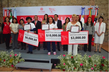 Graciela Ordoñez, left, Norma Lopez, center, and Maria Guzman, right are honored during the 2015 Dia de la Socia Lider prize ceremony for their strength and leadership. The prize awards come with cash prizes (in Mexican pesos) for the women to invest in their thriving businesses